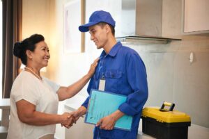 Satisfied client after professional water extraction service